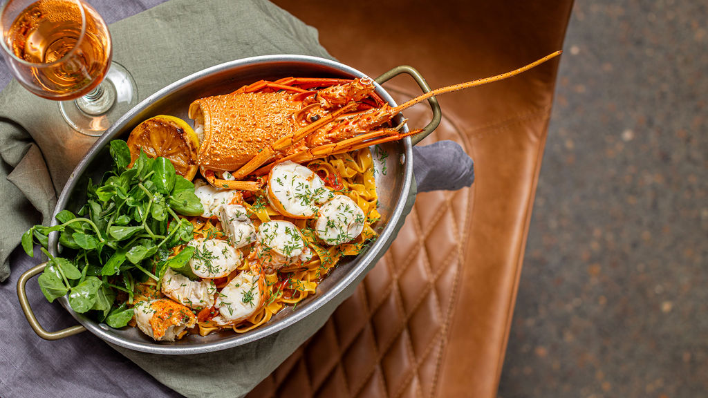 Image shows Australian Lobster prepared by the chefs at Estancia Osteria at Adina Lovedale