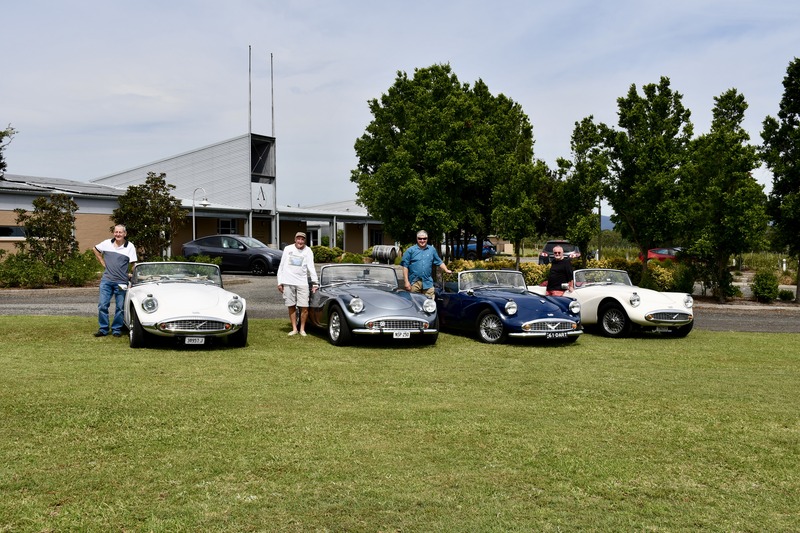 Image show the members of the Daimler SP250 Club at Adina Vineyard