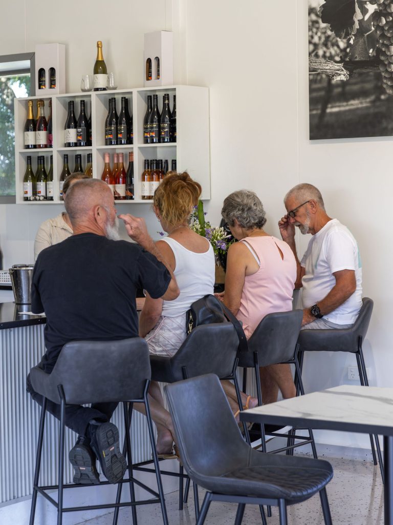 AdinaAccomandCars.Nov2025.CreditMegannEvansPhotography-910 Guests enjoying a premium wine and olive tasting inside The GT Room.