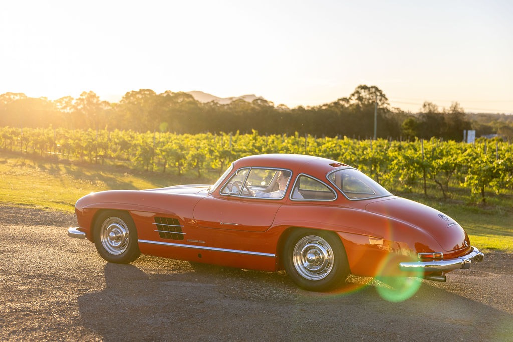 Red Mercedes-Benz SL 300 Gullwing onsite at Adina Vineyard